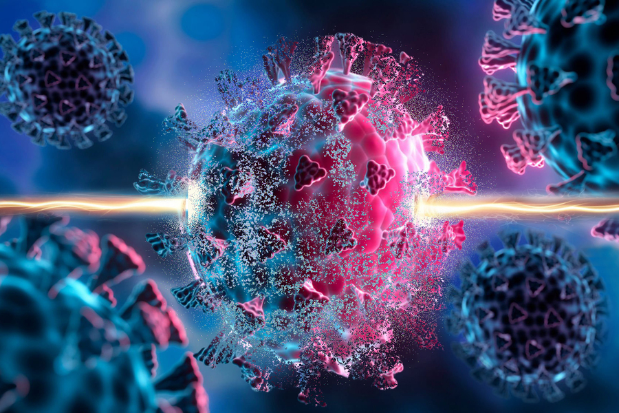 3D rendered coronavirus particles glowing in pink and cyan, with central particle fragmenting and dispersing outward.