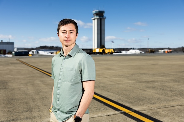 Randall Pietersen standing on the Hanscom Field tarmac.
