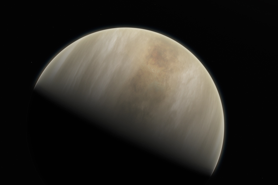 Half-illuminated view of Venus showing swirling cloud layers in warm tan and white tones against a black space background.