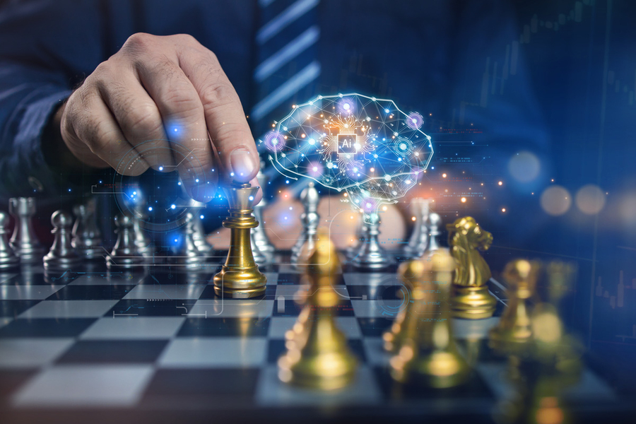A hand in a business suit moves a gold chess queen on a board while a glowing blue AI brain hologram hovers above, representing artificial intelligence strategy and machine learning decision-making.